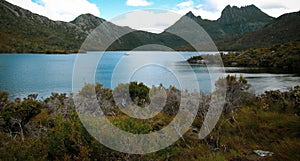 Overcast day at Dove Lake in Northern Tasmania with some blue sky in between the clouds