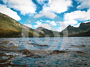 Overcast day at Dove Lake in Northern Tasmania with some blue sky in between the clouds