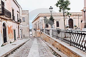 An overcast day in an empty street in the town of salve in puglia italy