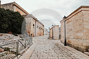 An overcast day in an empty street in the town of salve in puglia italy