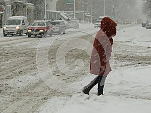 Overcast. Natural disasters winter, blizzard, heavy snow paralyzed city car roads, collapse. Snow covered cyclone