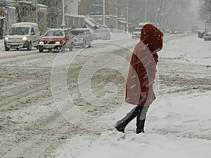Overcast. Natural disasters winter, blizzard, heavy snow paralyzed city car roads, collapse. Snow covered cyclone photo
