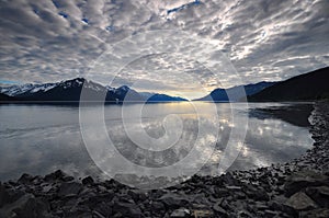 Overcast sky reflecting on water