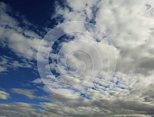 Overcast smooth clouds texture on blue day sky background