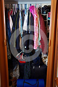 Overcrowded Small Clothes Closet