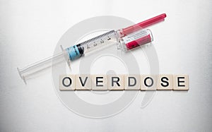 Overdose, Syringe and Vial on Stainless Steel