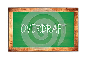 OVERDRAFT text written on green school board