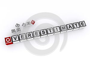 overestimate word block on white photo