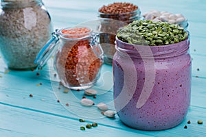 Overfilled split peas in a glass can.