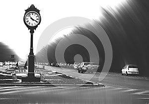 Overfiltered art concept with vintage clock in dark urban landscape