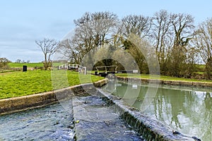 The overfow to a lock gate on the Grand Union Canal close to Welford, UK