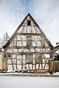 Overgrown Half-Timbered House In Village, Germany