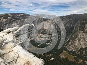 An overhanging rock cliff at Glacier Point overlook, Rock face view at Yosemite NP, USA