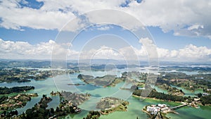 Overhead aerial drone view of GuatapÃ© reservoir in Colombia