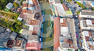 Overhead aerial view of Amphawa Market at sunset, famous floating market near Bangkok, Thailand