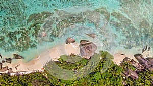 Overhead aerial view of Anse Source Argent Beach in La Digue, Seychelle Islands - Africa