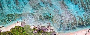 Overhead aerial view of Anse Source Argent Beach in La Digue, Seychelle Islands - Africa