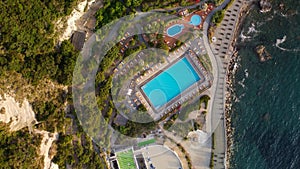 Overhead aerial view of Ischia Citara Beach at sunset with pools and sand photo