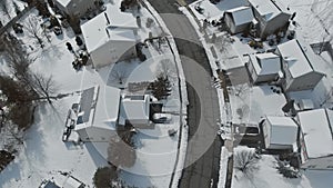 Overhead aerial view of residential houses and village houses covered in snow