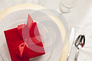 Overhead Christmas or Valentine Gift on Elegant Table Place Setting