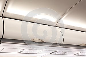 Overhead compartment in commercial aircraft.