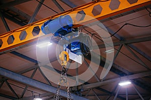 Overhead crane in the industrial building, close up