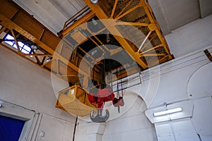 Overhead crane in the industrial building, close up