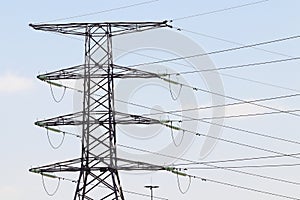 Overhead Electrical Power Pylon And Power Lines