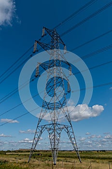 Overhead electricity power cables on a pylon