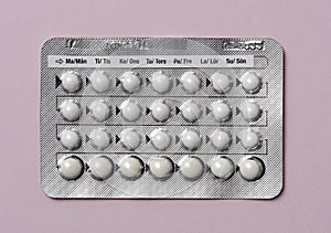 Overhead of a full chart of birth control pills