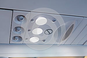 Overhead light and air conditioner in airplane cabin