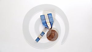 Overhead moving view of UN Peacekeeper`s medal