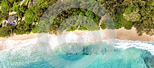 Overhead panoramic view of beautiful tropical beach with trees photo