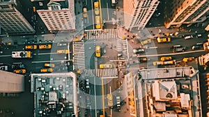 An overhead perspective of a bustling city street with multiple yellow taxis in motion, An overhead view of an electric taxi in a