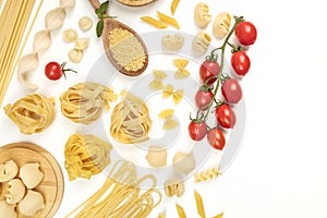 Overhead photo of different types of pasta with cherry tomatoes on white with copy space