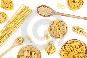 Overhead photo of different types of pasta on white with copy space