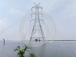 An overhead power line is a structure used in electric power transmission and distribution at darbhanga muzafferpur bihar india hi