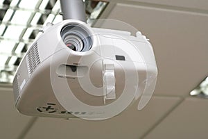 Overhead projector under the ceiling in boardroom