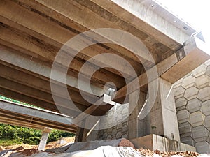 Overhead road under construction. The massive concrete column used to support the concrete road deck.