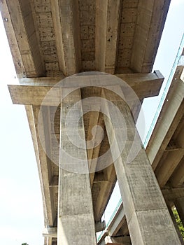 Overhead road under construction. The massive concrete column used to support the concrete road deck.