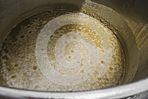Overhead shot of beer in the fermenter just after the primary fermentation