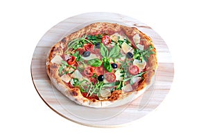 Overhead  shot of Bufala pizza on wooden plank photo