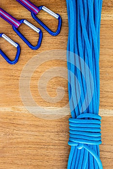 Overhead shot of colorful rock climbing equipment under the light