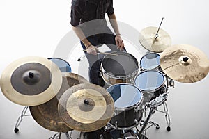 Overhead Shot Of Drummer Playing Drum Kit In Studio