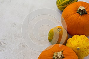 Overhead shot of pumpkins on a bright background and space for text