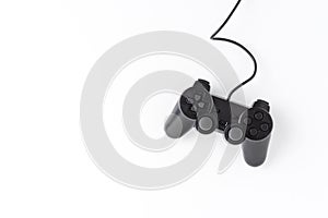 Overhead shot of video game controller isolated on white background with copyspace