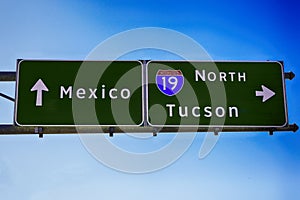 Overhead sign pointing to Mexico or Tucson AZ