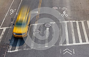 Overhead street view of yellow taxi cab in New York City