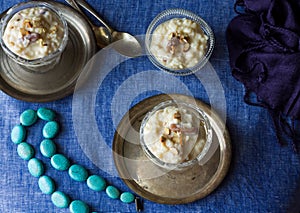 Overhead or top view of rice kheer or payasam or payesh or khir,Indian rice pudding during Diwali,Dussehra,Durga Puja.