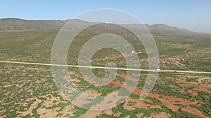 Overhead Track view of Outback Off Roader on Dirt Road